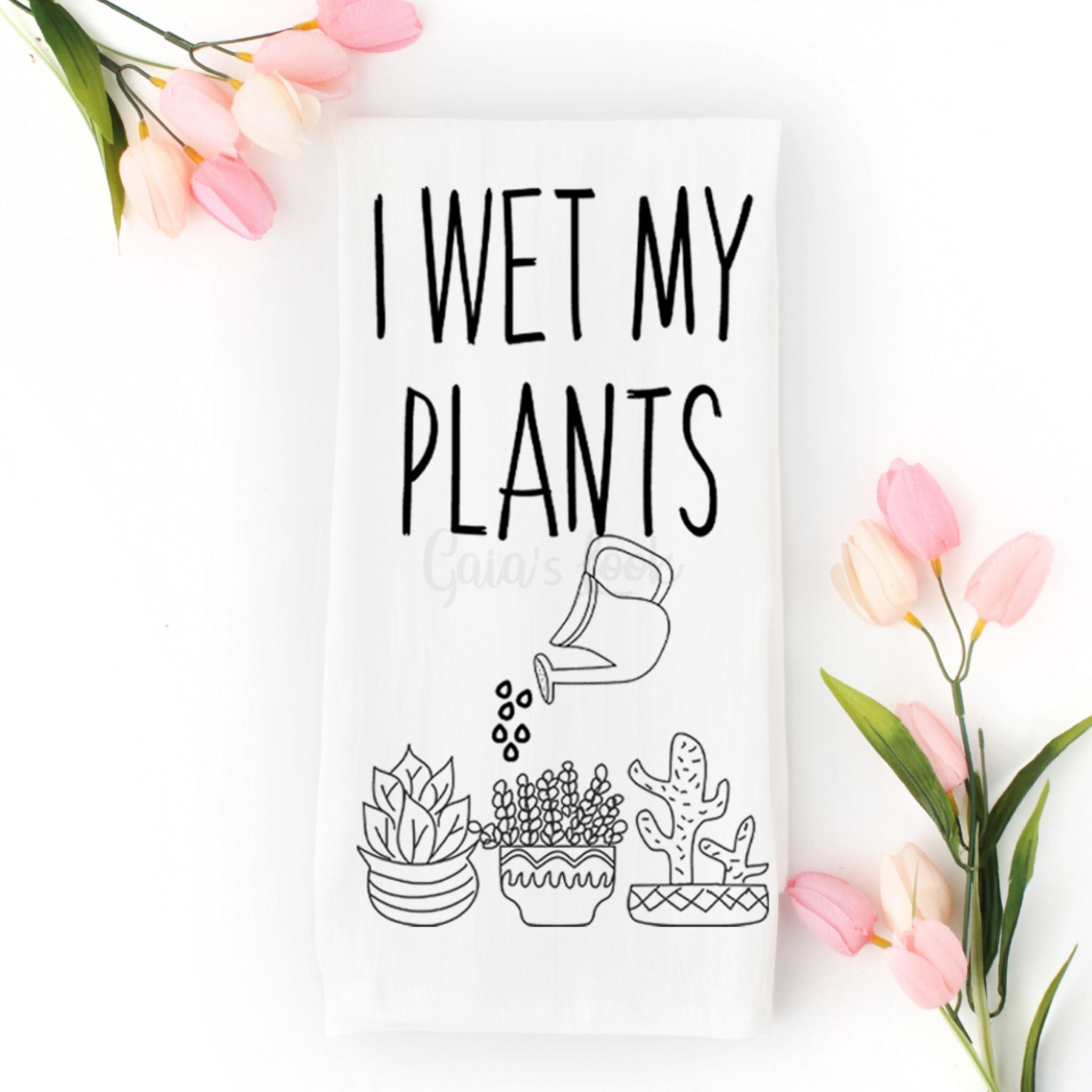 I wet my plants tea towel with flowers